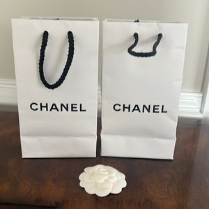 Two Chanel bags and Chanel flour unused